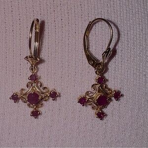 14k gold earrings with rubies.